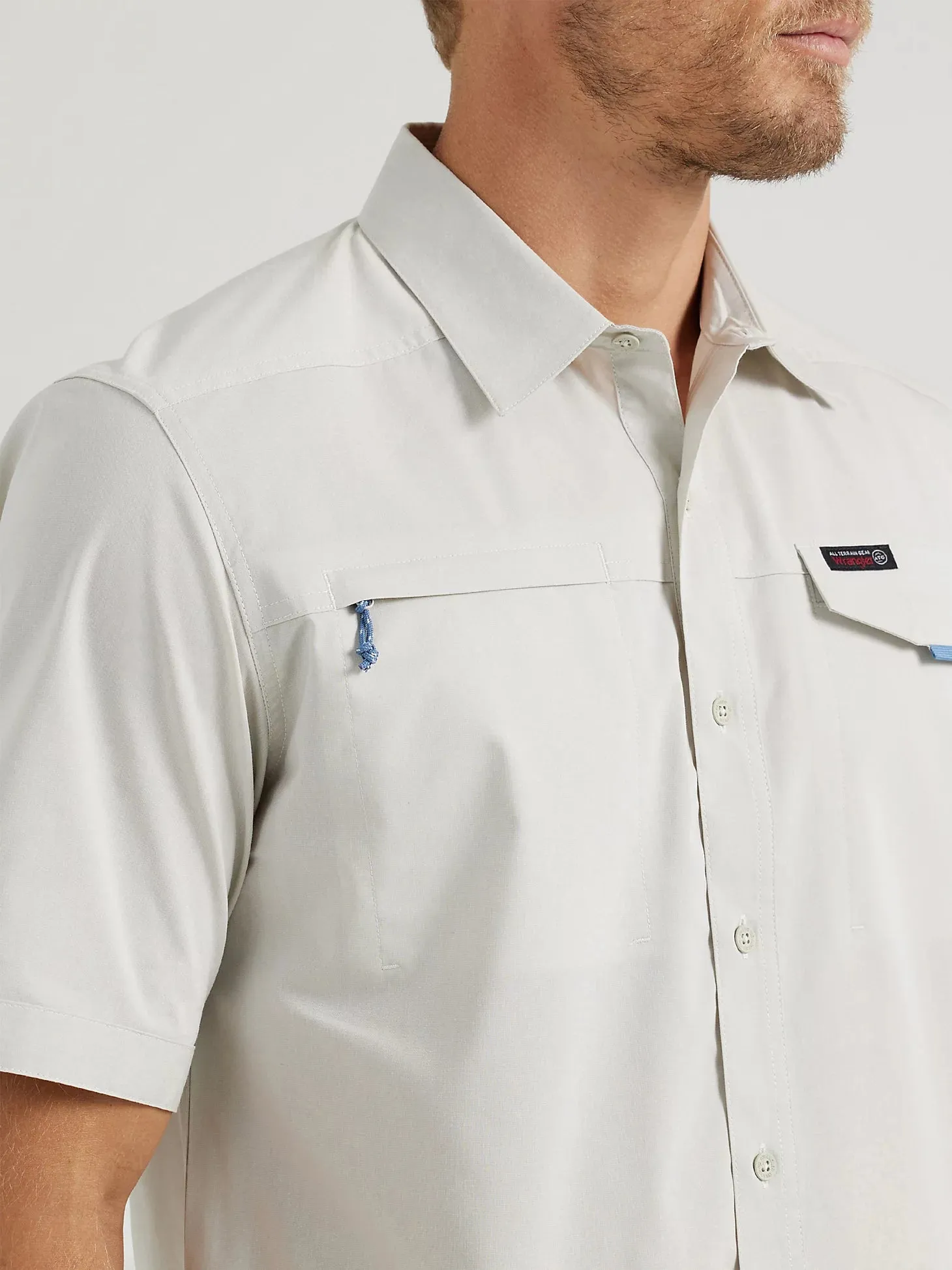 WRANGLER ATG MEN'S ASYMMETRICAL ZIP POCKET SHIRT IN BLUE FOX